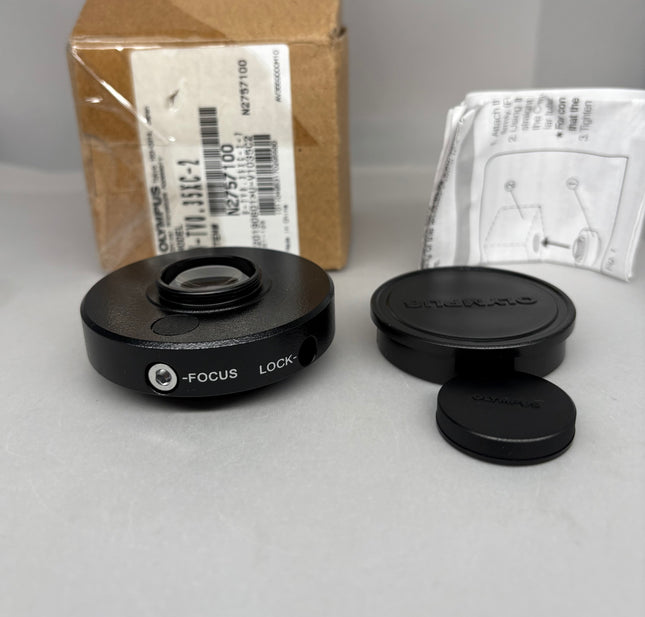 Olympus U-TV0.35XC-2 Microscope C-mount Camera Adapter components including focus mechanism and cover cap.