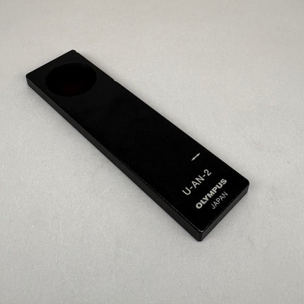 Olympus Microscope Analyzer Slider U-AN-2 on a light background, used but in good optical condition.