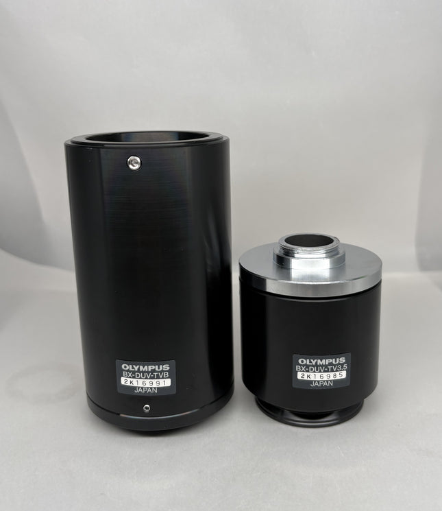 Olympus BX-DUV-TV3.5 / BX -DUV-TVB Microscope C-mount Camera Adapter displaying two components.