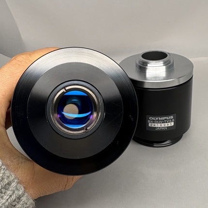 Olympus BX-DUV-TV3.5 / BX -DUV-TVB Microscope C-mount Camera Adapter shown in hand, used, in good optical condition.