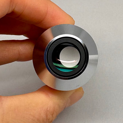 Nikon LU Plan ELWD 20x0.40 ∞/0 EPI WD 13 M25 Microscope Objective front view held in hand.