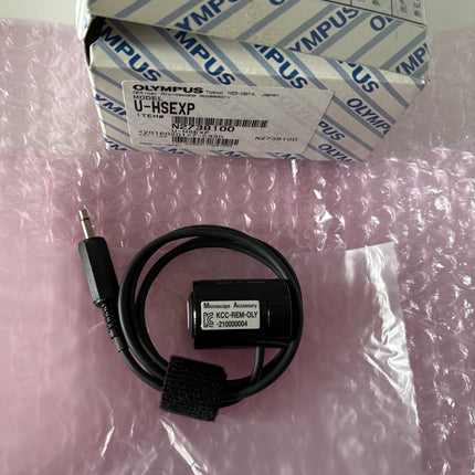 Olympus U-HSEXP Hand Switch for Image Capture on packaging with cable and connector.