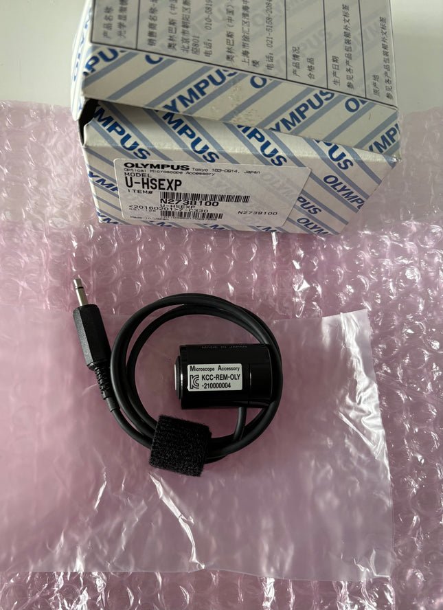 Olympus U-HSEXP Hand Switch for Image Capture on packaging with cable and connector.