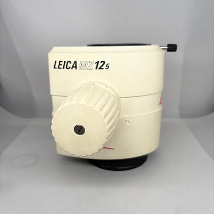 Leica MZ12.5 Stereo Microscope Zoom body 10446370 shown from the side, in good optical condition.