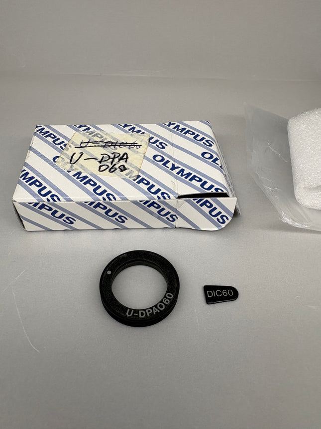 Olympus Microscope U-DPAO60 DIC Nomarski Prism components including U-DPA60 ring and DIC60 part.