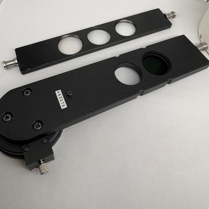 Nikon Pol Microscope P-I Intermediate Tube W/Analyzer-NC W/P-CL Quarter Wave Tint Plate components on a gray surface.