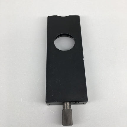Olympus Microscope U-DICT Transmitted DIC Nomarski Prism Slider shown from top view with a circular opening.