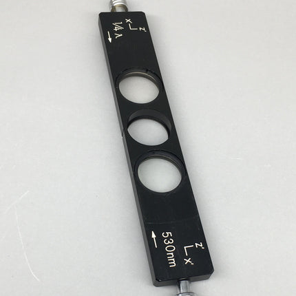 Nikon POL λ Full Wave Red Plate 1/4 Compensator 530nm Microscope Slider depicted on a gray background