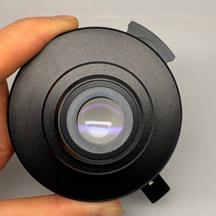 Nikon Microscope C-C Slider Achr NA=0.9 condenser view from above, showing lens and adjustment features.