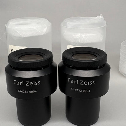 Pair Of Zeiss Microscope Eyepieces E-PI 10x/20 444232-9904-000 displayed in packaging.