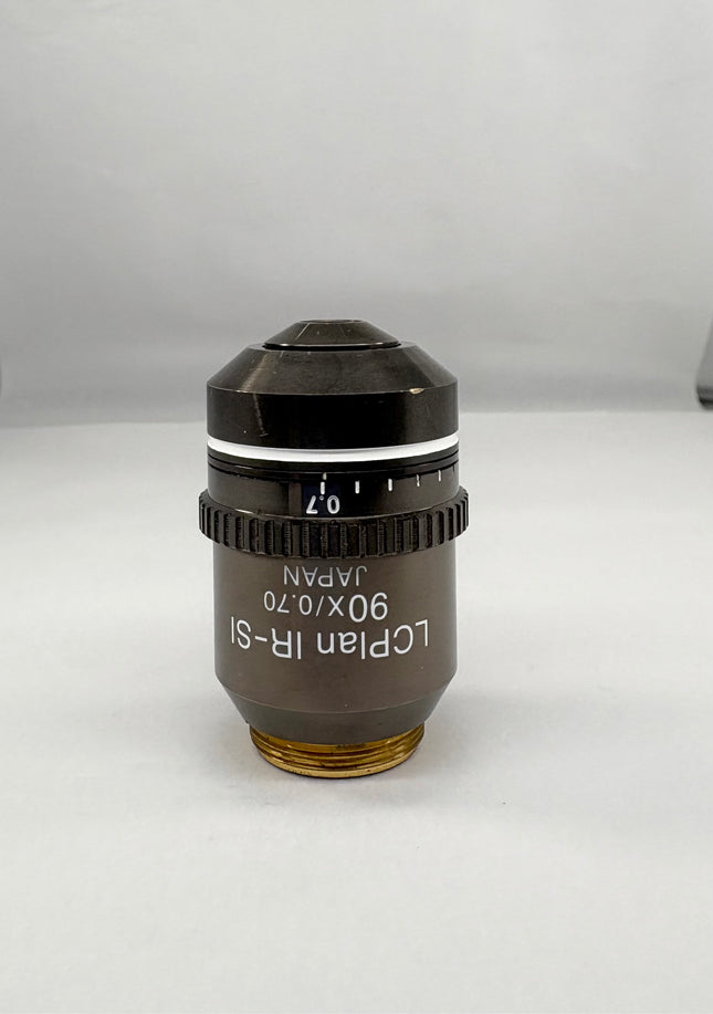 Olympus LCPlan IR-SI 90x0.70 ∞/SI 0-0.7 Objective RMS Thread  showing detailed design and labeling features.