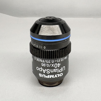 Olympus UPlanSApo 40x0.95 ∞/0.11-0.23/FN26.5 Microscope UIS2 Objective lens on a white background.